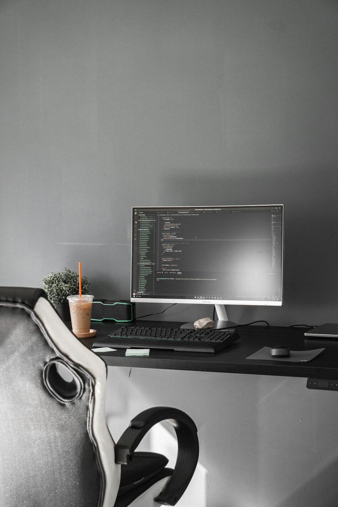 programmer coding at desk