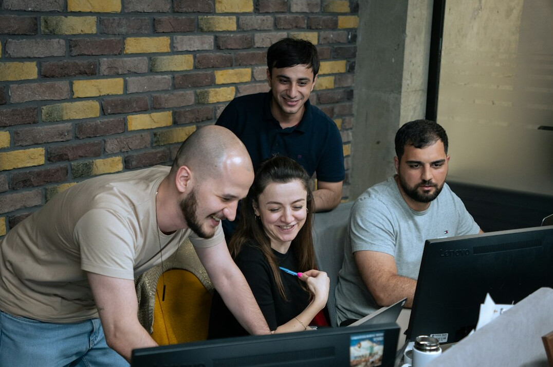 software developers coding together